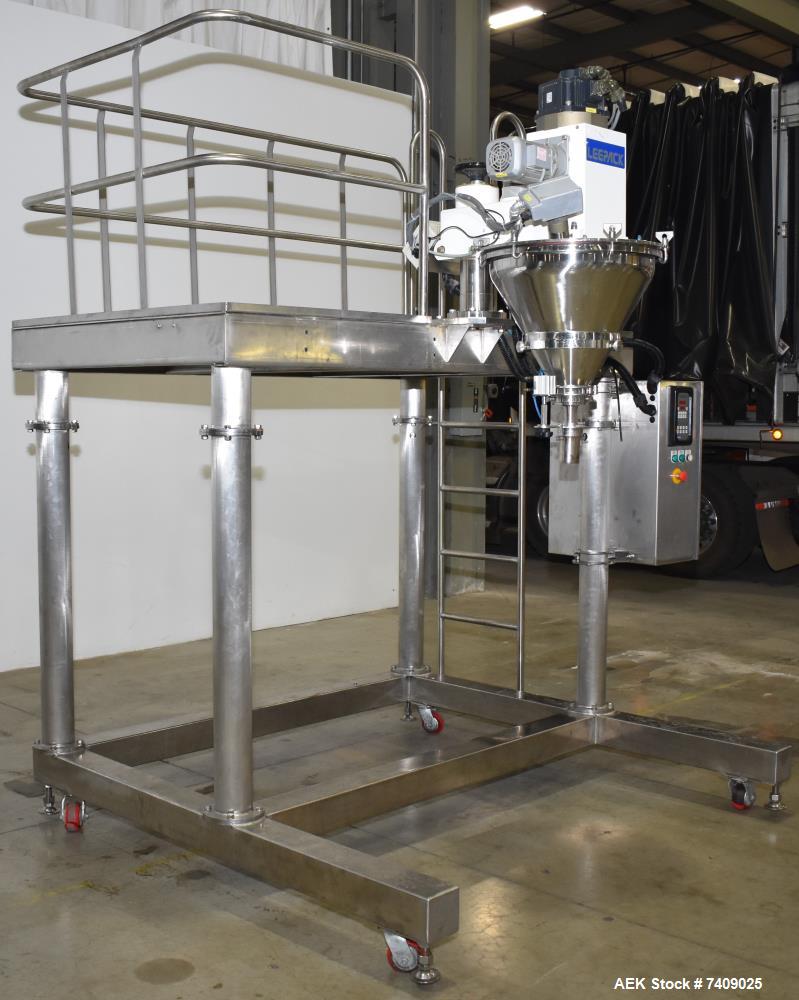 Used Leepack Servo Drive Powder Auger Feeder, Model AW-590IV. Mitsubishi model MR-JZS-200A servo drive. Foot pedal switch. Level sensor. Mounted on stainless steel frame with casters. 3/60/480 Volt.